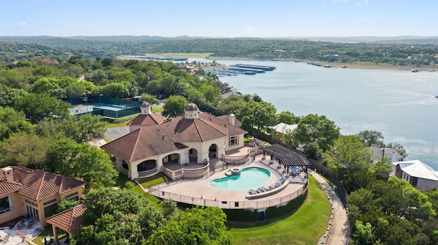 birds eye view of property featuring a water view