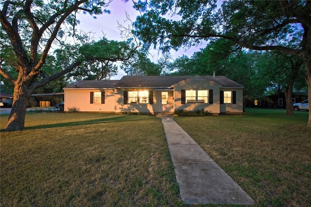 view of front facade with a front lawn