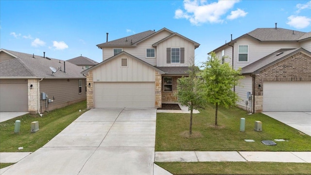 traditional-style home with board and batten siding, an attached garage, driveway, and a front lawn