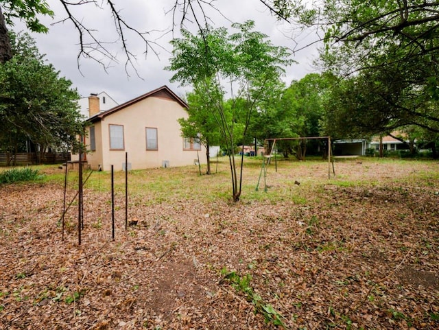 810 E 45th St, Austin, TX 78751 - view of yard with a detached carport