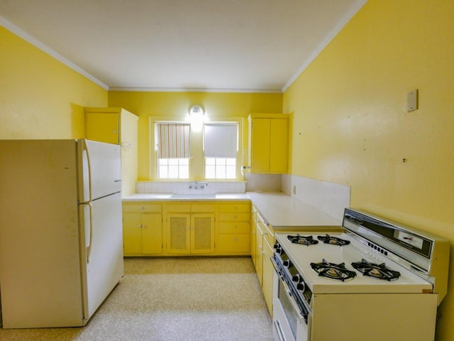 810 E 45th St, Austin, TX 78751 - kitchen featuring light countertops, crown molding, white appliances, and a sink