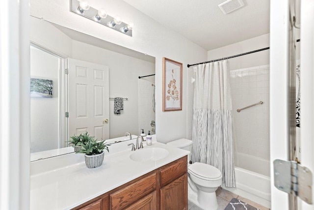 bathroom with visible vents, tile patterned flooring, vanity, shower / bath combination with curtain, and toilet