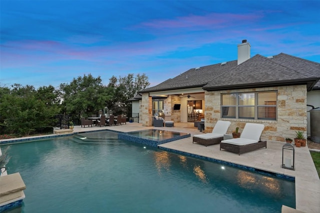831 Sad Willow Pass, Driftwood, TX 78619 - view of pool featuring a patio, a pool with connected hot tub, fence, and a ceiling fan