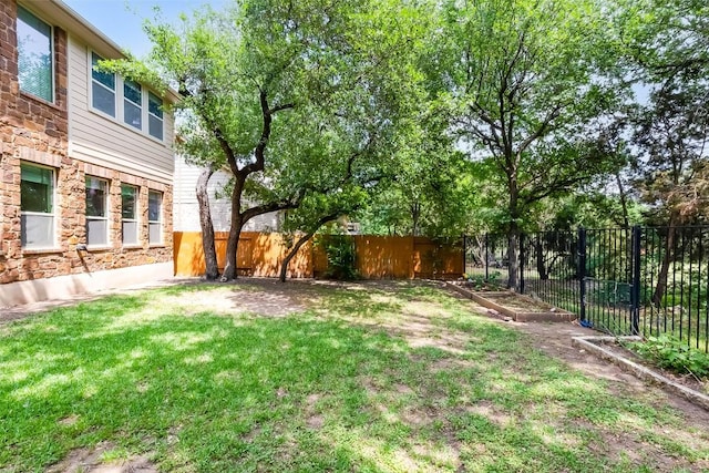 view of yard with fence