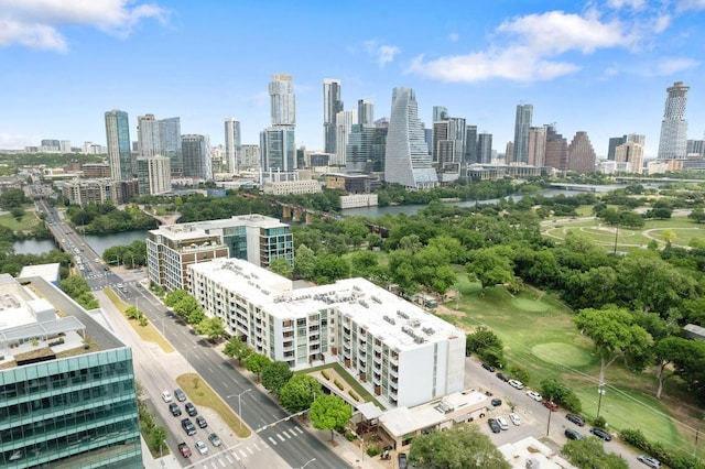 birds eye view of property with a view of city