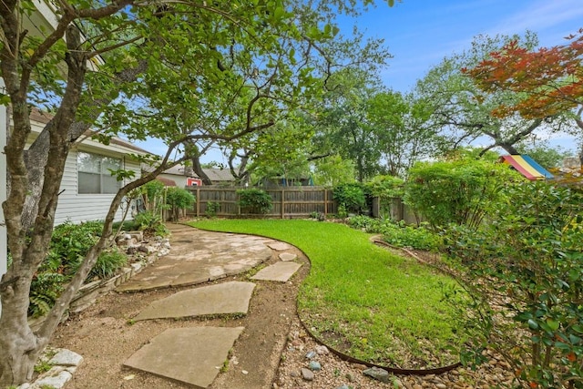 view of yard with a patio and a fenced backyard