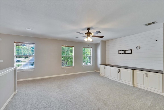 3957 Canyon Glen Cir, Austin, TX 78732 - empty room with light colored carpet and ceiling fan