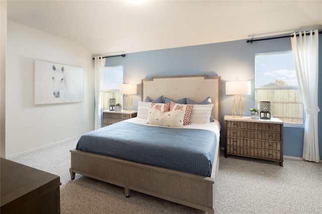 bedroom featuring carpet flooring and baseboards