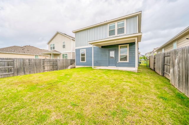 10401 American Paint Way, Manor, TX 78653 - rear view of property featuring board and batten siding and a patio