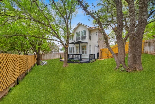12407 Old Salt Trl, Austin, TX 78732 - rear view of house featuring a yard and a fenced backyard