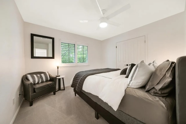 12407 Old Salt Trl, Austin, TX 78732 - bedroom featuring baseboards, ceiling fan, a closet, and light carpet