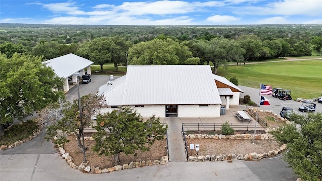102 Vandeventer Dr, Burnet, TX 78611 - drone / aerial view of a forest and a golf course