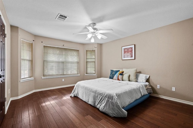 102 Vandeventer Dr, Burnet, TX 78611 - bedroom featuring baseboards, wood-type flooring, and ceiling fan