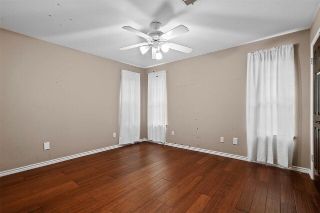 102 Vandeventer Dr, Burnet, TX 78611 - unfurnished room featuring ceiling fan, hardwood / wood-style flooring, and baseboards