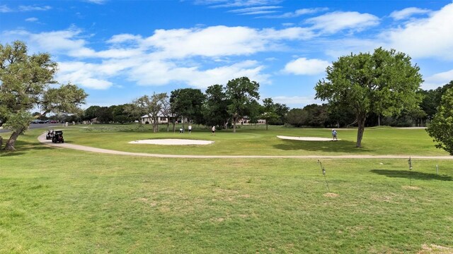 102 Vandeventer Dr, Burnet, TX 78611 - view of community featuring a lawn and golf course view