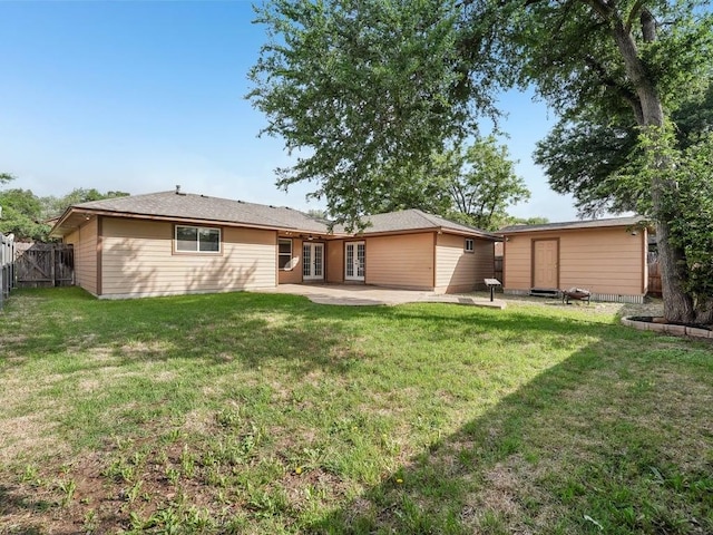 11911 Aloe Vera Trl, Austin, TX 78750 - rear view of house with french doors and a patio
