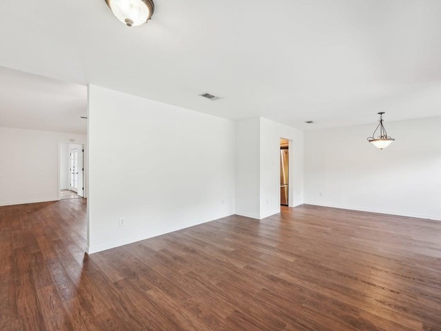 11911 Aloe Vera Trl, Austin, TX 78750 - unfurnished room with dark wood finished floors and baseboards