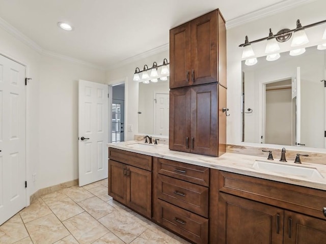 11911 Aloe Vera Trl, Austin, TX 78750 - full bath with double vanity, crown molding, and baseboards