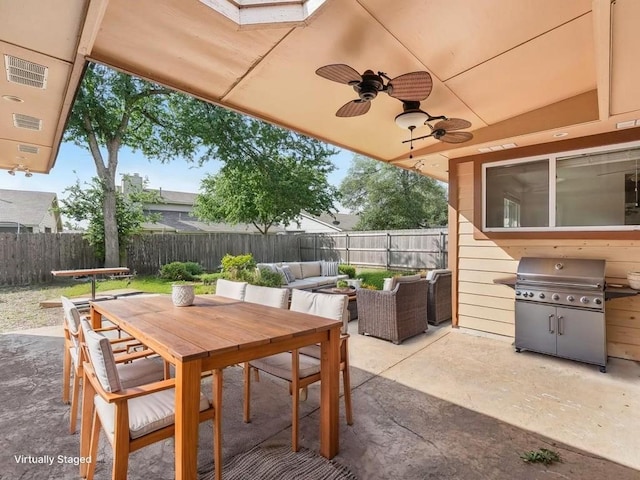 11911 Aloe Vera Trl, Austin, TX 78750 - fenced backyard featuring area for grilling, a patio, a ceiling fan, an outdoor hangout area, and outdoor dining area