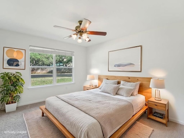 11911 Aloe Vera Trl, Austin, TX 78750 - bedroom featuring light colored carpet, baseboards, and a ceiling fan