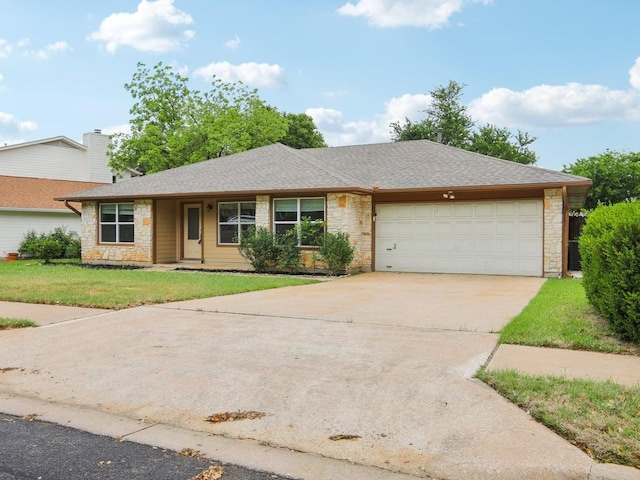 11911 Aloe Vera Trl, Austin, TX 78750 - ranch-style house with stone siding, a garage, driveway, a front lawn, and a shingled roof