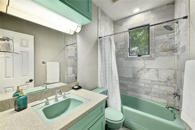 full bath featuring vanity, toilet, and shower / tub combo with curtain