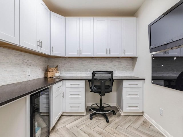 unfurnished office with beverage cooler