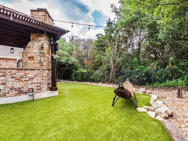 view of yard with fence