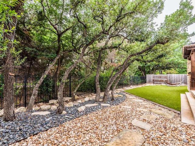 view of yard featuring a fenced backyard and a patio area