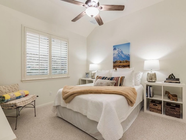 bedroom featuring baseboards, carpet flooring, a ceiling fan, and lofted ceiling