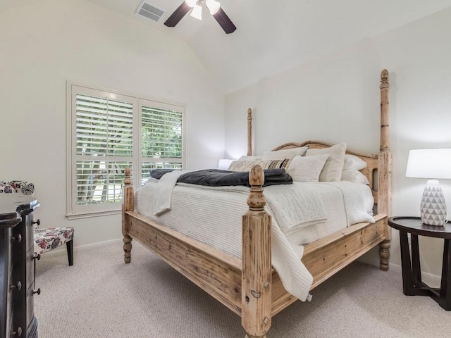 bedroom with visible vents, lofted ceiling, light carpet, baseboards, and ceiling fan