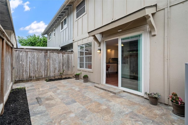 7253 Creekside Dr, Austin, TX 78752 - view of patio with a sink and a fenced backyard