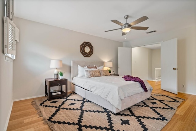 7253 Creekside Dr, Austin, TX 78752 - bedroom with visible vents, a ceiling fan, baseboards, and light wood-type flooring