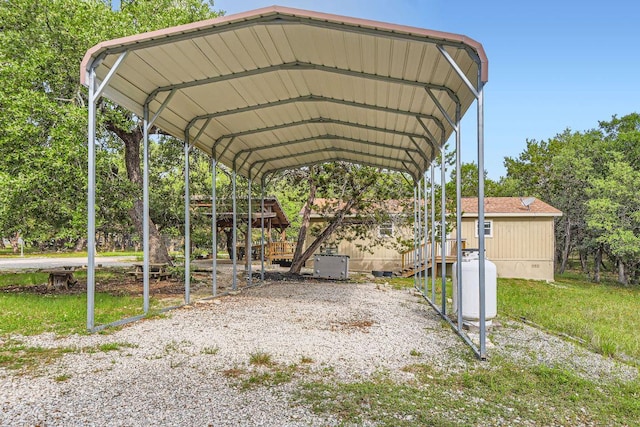 view of parking with a carport