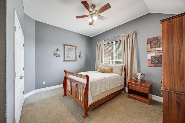 carpeted bedroom with baseboards, a ceiling fan, and lofted ceiling