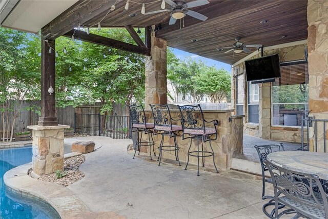 2607 Armatrading Dr, Cedar Park, TX 78613 - fenced backyard with a ceiling fan and a patio