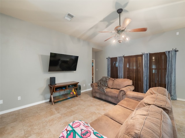 living room with visible vents, a ceiling fan, baseboards, and tile patterned flooring