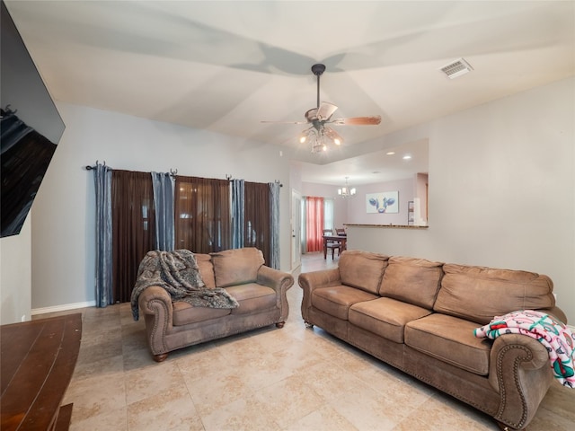 419 Spyglass St, Marble Falls, TX 78654 - living area with a ceiling fan, a chandelier, and baseboards