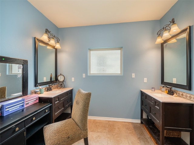 419 Spyglass St, Marble Falls, TX 78654 - bathroom with two vanities and baseboards