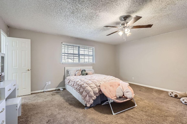 bedroom featuring a textured ceiling, ceiling fan, baseboards, and carpet