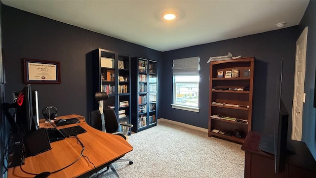 home office featuring baseboards and carpet flooring