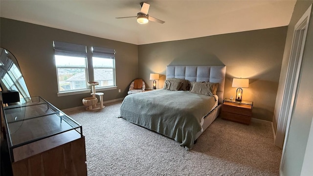 bedroom with carpet floors, a ceiling fan, and baseboards