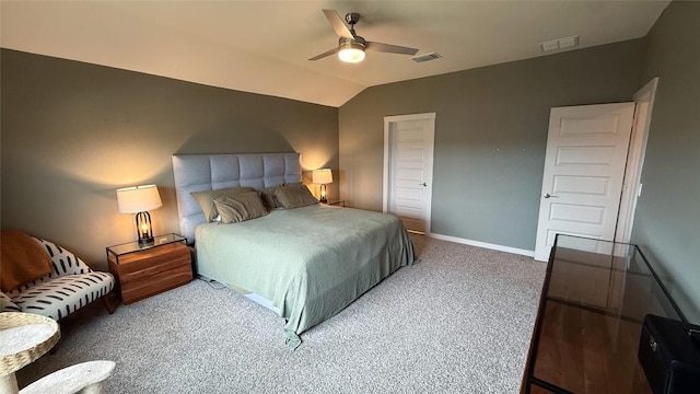 carpeted bedroom featuring baseboards, visible vents, ceiling fan, and vaulted ceiling