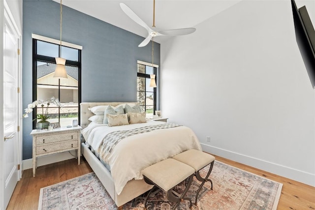 1016 Ferguson Mill Rd, Salado, TX 76571 - bedroom featuring baseboards, a ceiling fan, and wood finished floors