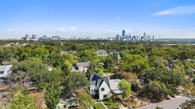 birds eye view of property with a view of city