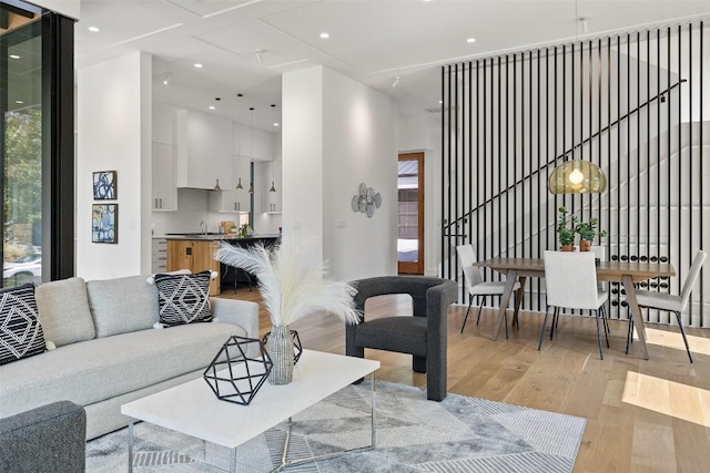 living room featuring recessed lighting and light wood-style floors
