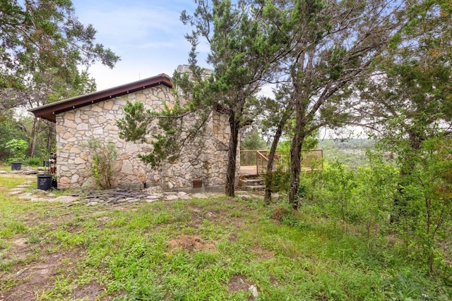 8100 Kuhn Dr, Austin, TX 78736 - view of side of property with stone siding