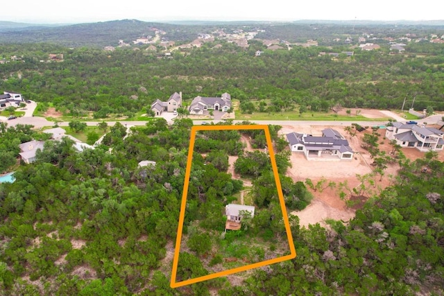 8100 Kuhn Dr, Austin, TX 78736 - birds eye view of property with a forest view