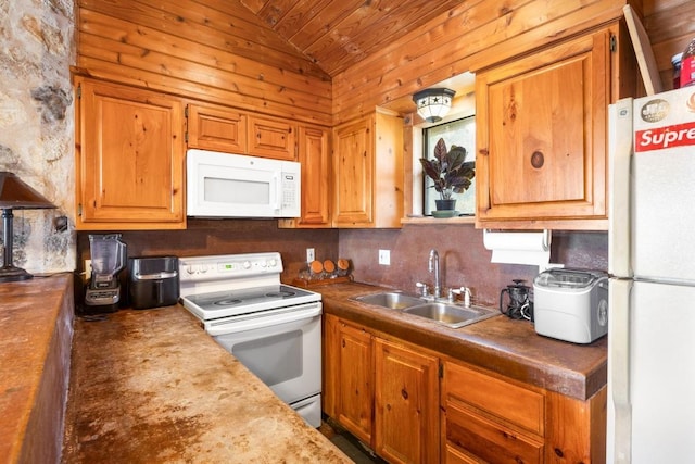 8100 Kuhn Dr, Austin, TX 78736 - kitchen with a sink, white appliances, wooden ceiling, lofted ceiling, and tasteful backsplash