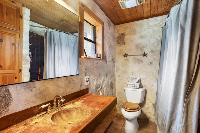 8100 Kuhn Dr, Austin, TX 78736 - full bath with wood ceiling, a shower with curtain, visible vents, vanity, and toilet